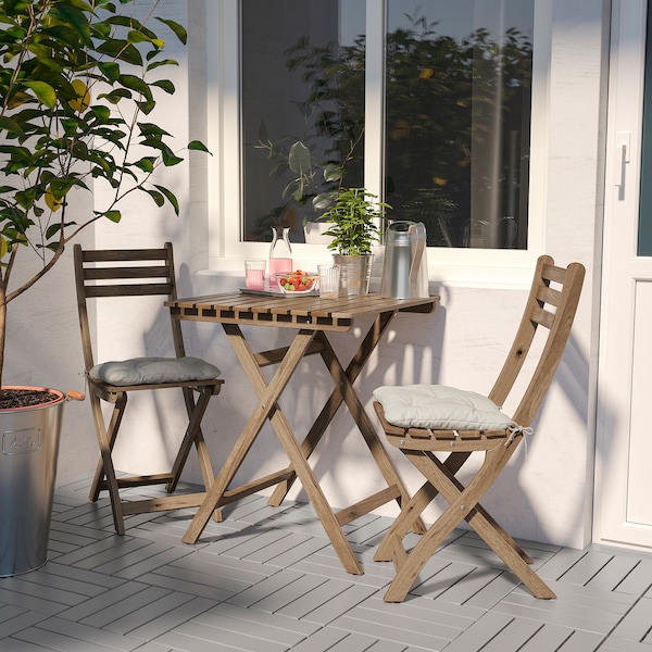 IKEA ASKHOLMEN table+2 chairs, outdoor, light brown stained/Kuddarna gray, Ikea Ireland | 0573MZQTV